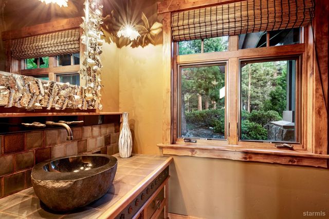 a kitchen with a sink and a window