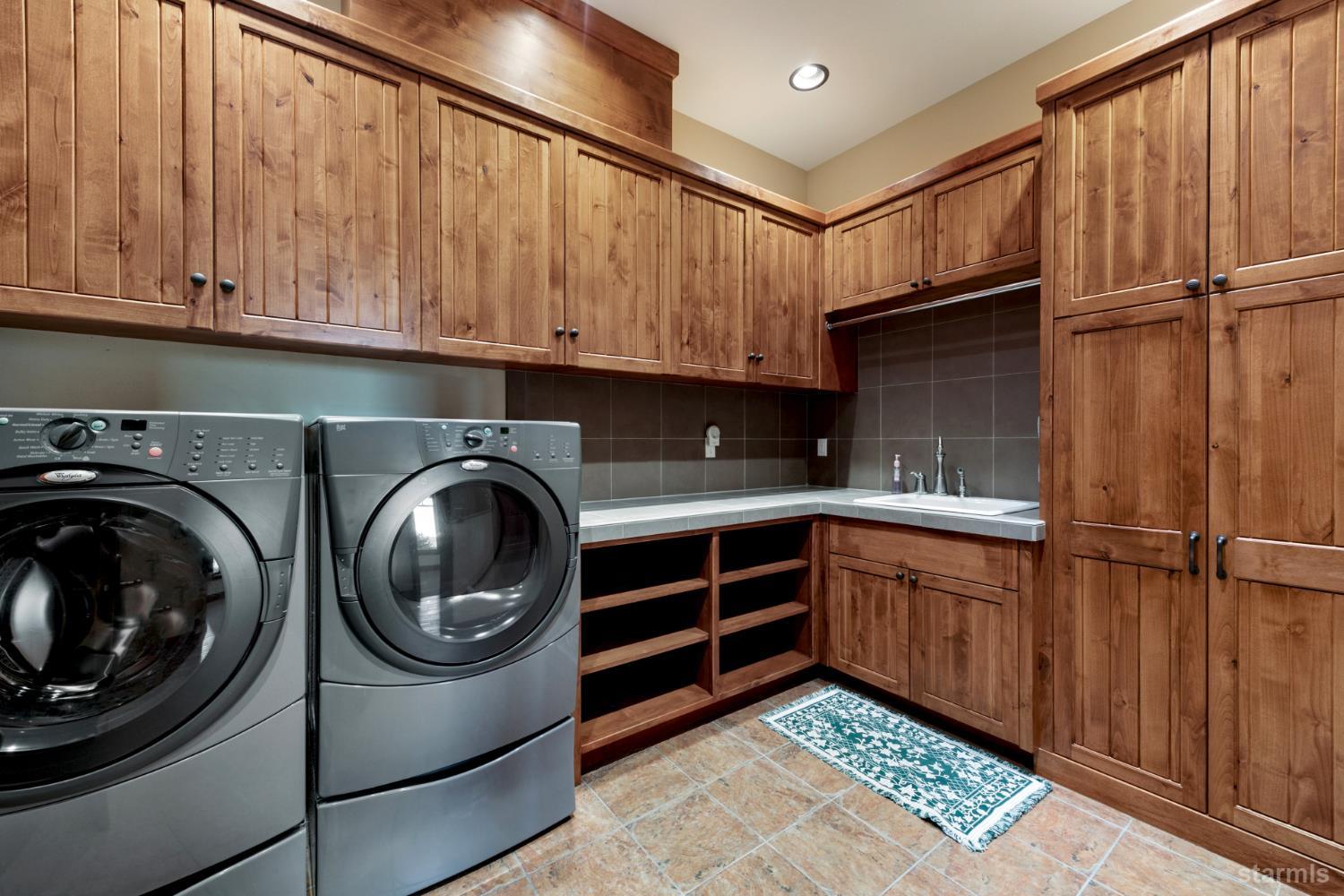 3567 Saddle Road South Lake Tahoe, CA 96150 - Photo 39 of 39 a utility room with sink dryer and washer
