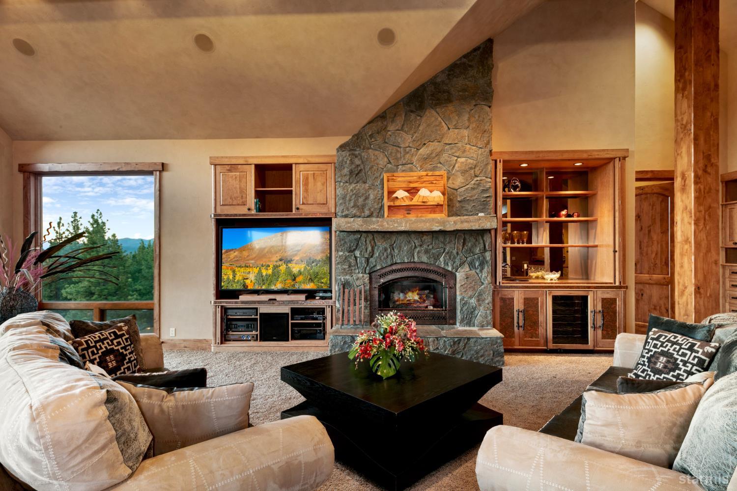 3567 Saddle Road South Lake Tahoe, CA 96150 - Photo 10 of 39 a living room with furniture and a fireplace