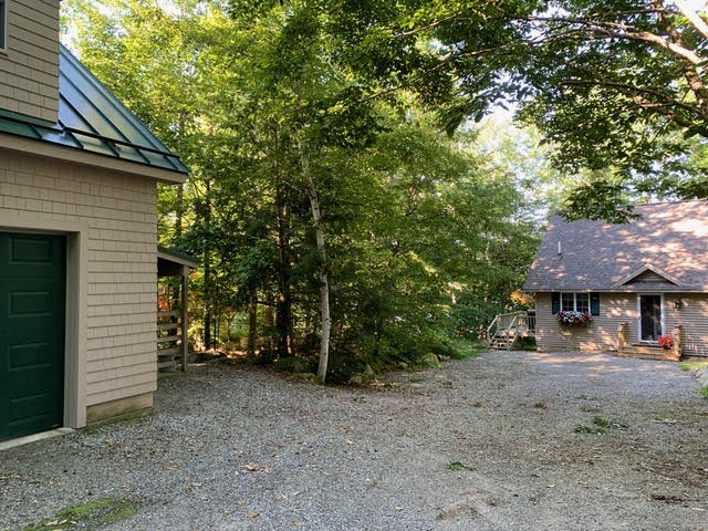 149 Peninsula Drive Rome, ME 04963 - Photo 49 of 80 Garage in relation to house