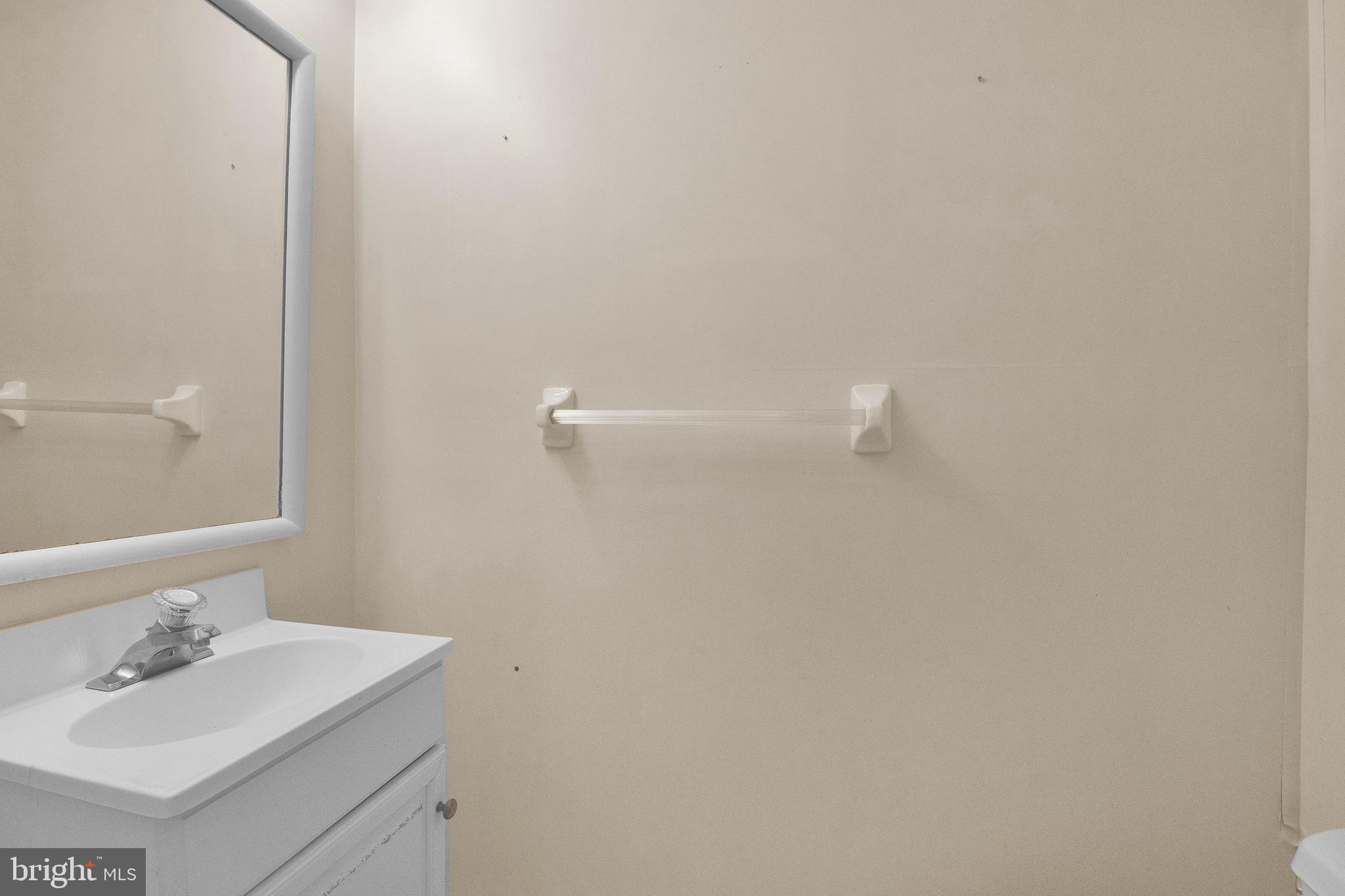 192 Clay Street Annapolis, MD 21401 - Photo 8 of 23 a bathroom with a sink and a mirror
