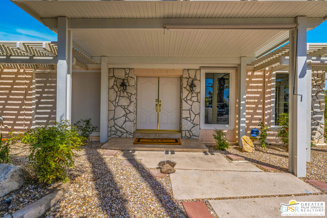 10 International Boulevard Rancho Mirage, CA 92270 - Photo 1 of 36 a front view of a house