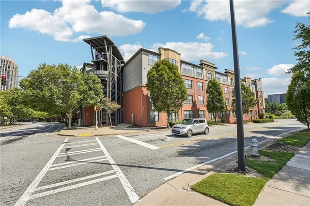 a view of a livingroom with furniture and window