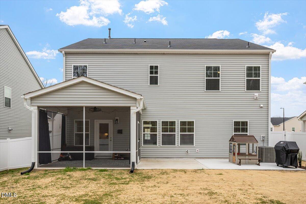 4038 Front Runner Drive Durham, NC 27703 - Photo 2 of 47 a front view of a house with a yard