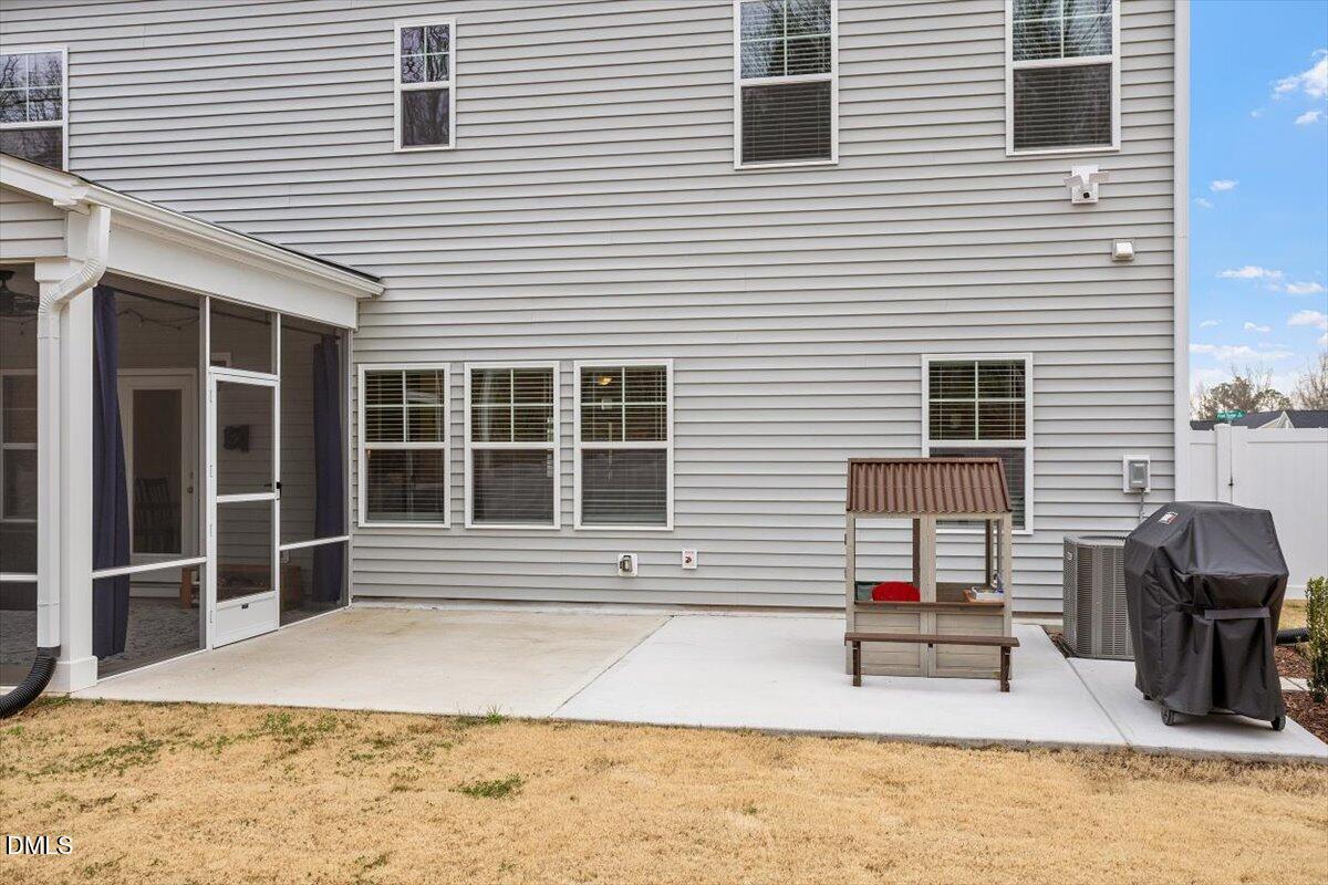 4038 Front Runner Drive Durham, NC 27703 - Photo 42 of 47 a view of a house with a patio