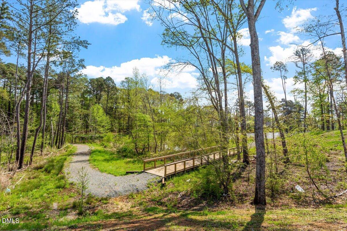 4038 Front Runner Drive Durham, NC 27703 - Photo 8 of 47 a view of lake from under an umbrella
