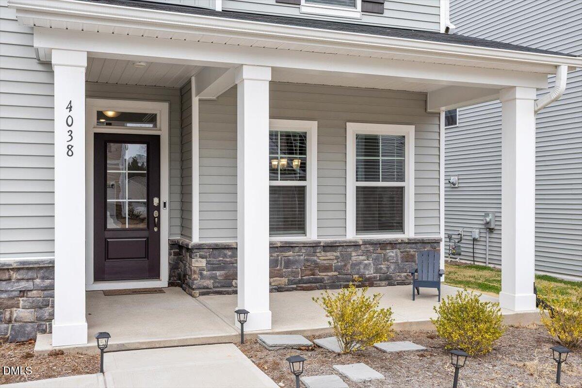 4038 Front Runner Drive Durham, NC 27703 - Photo 9 of 47 a front view of a house