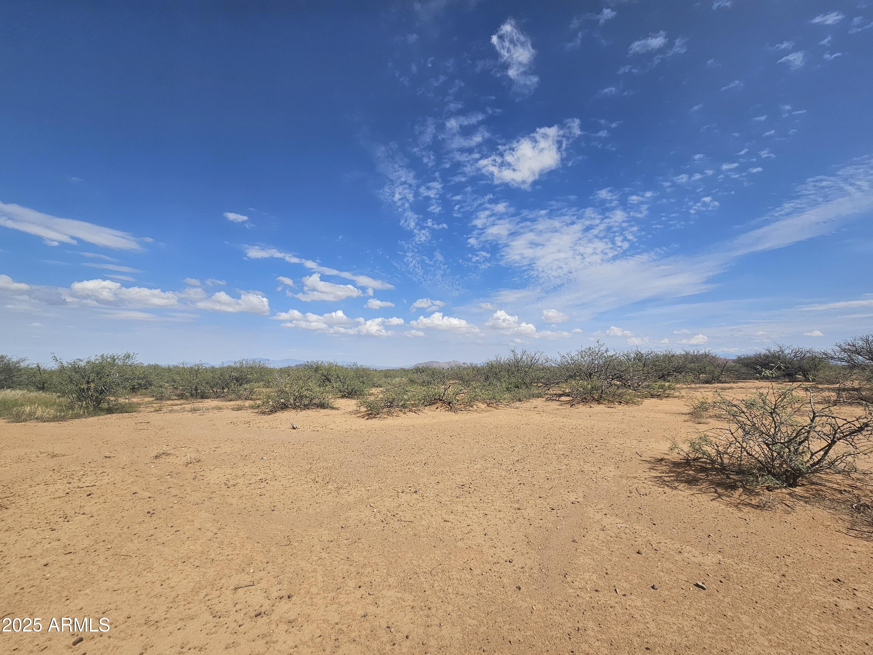 14 15 East & 16 Road, Unit 14 15 & 16 Pearce, AZ 85625 - Photo 13 of 14 a view of lake with sunset