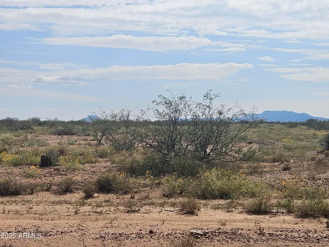 a view of lake with mountain