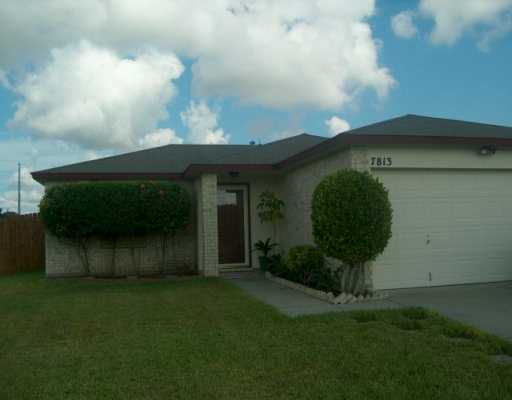 7813 Falcon Drive Corpus Christi, TX 78414 - Photo 1 of 6 a front view of a house with garden
