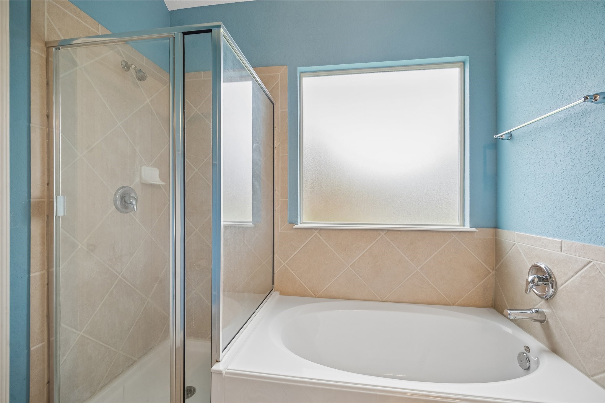 13006 Millstream Bend Lane Tomball, TX 77377 - Photo 13 of 25 a white bath tub sitting next to a shower