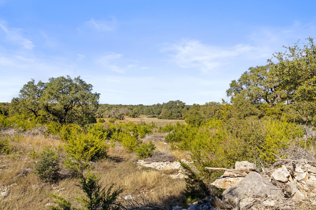 Tbd Lyda Ranch Road Bertram, TX 78605 - Photo 24 of 28 a view of a lake with mountains in the background
