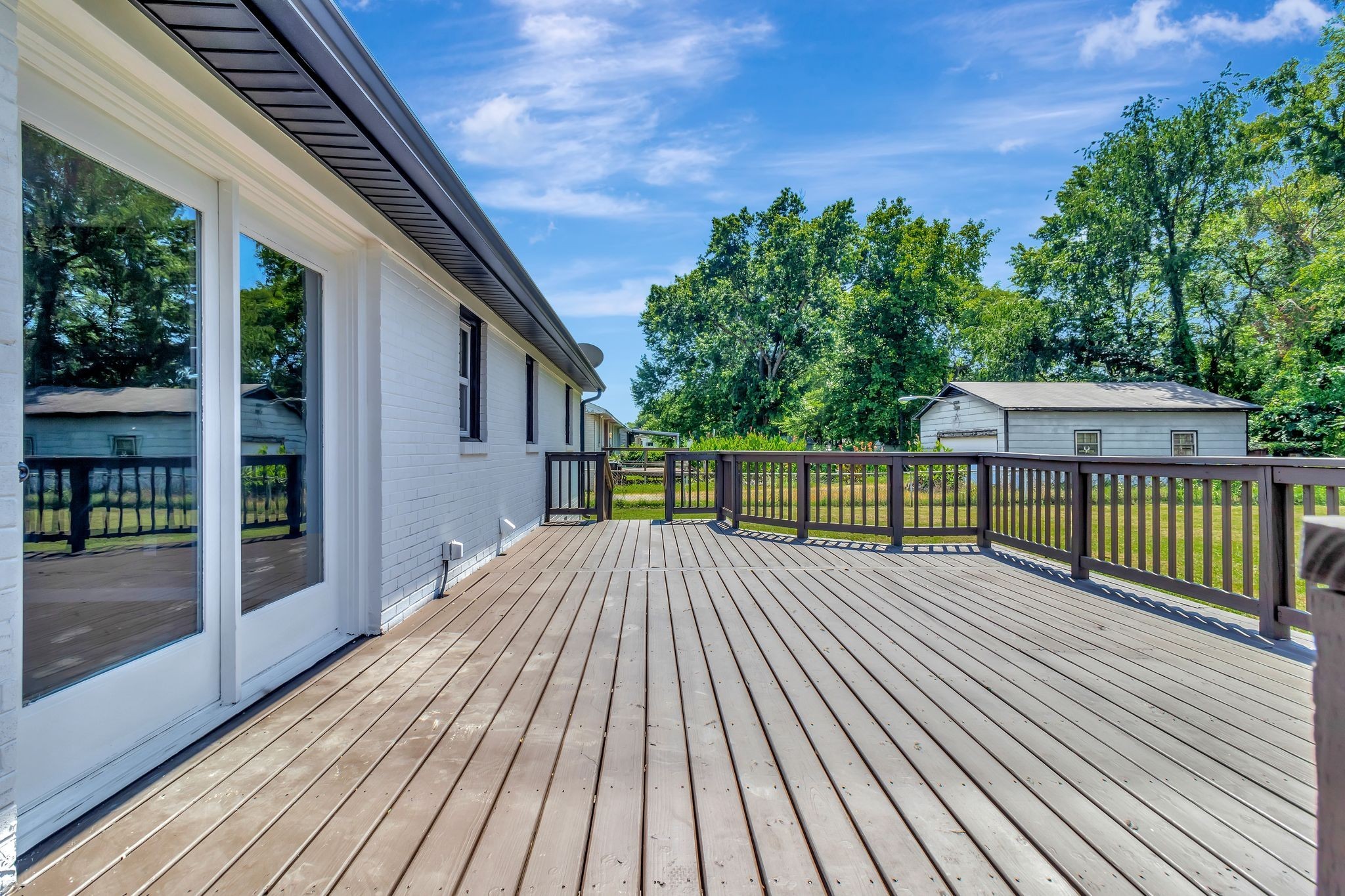 6799 Longview Drive Murfreesboro, TN 37129 - Photo 27 of 30 a view of backyard with a deck and wooden floor