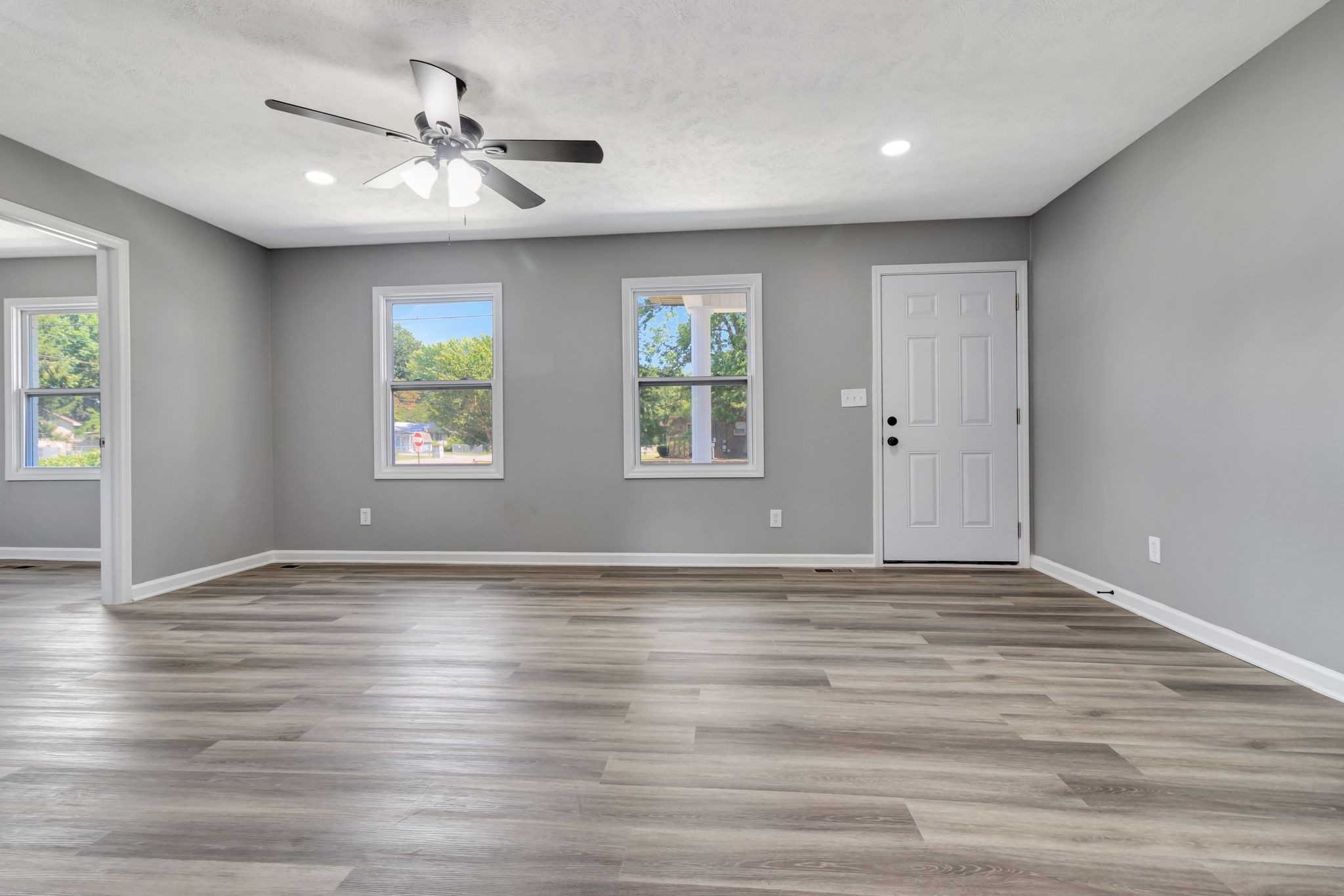 6799 Longview Drive Murfreesboro, TN 37129 - Photo 9 of 30 a view of an empty room with window and wooden floor