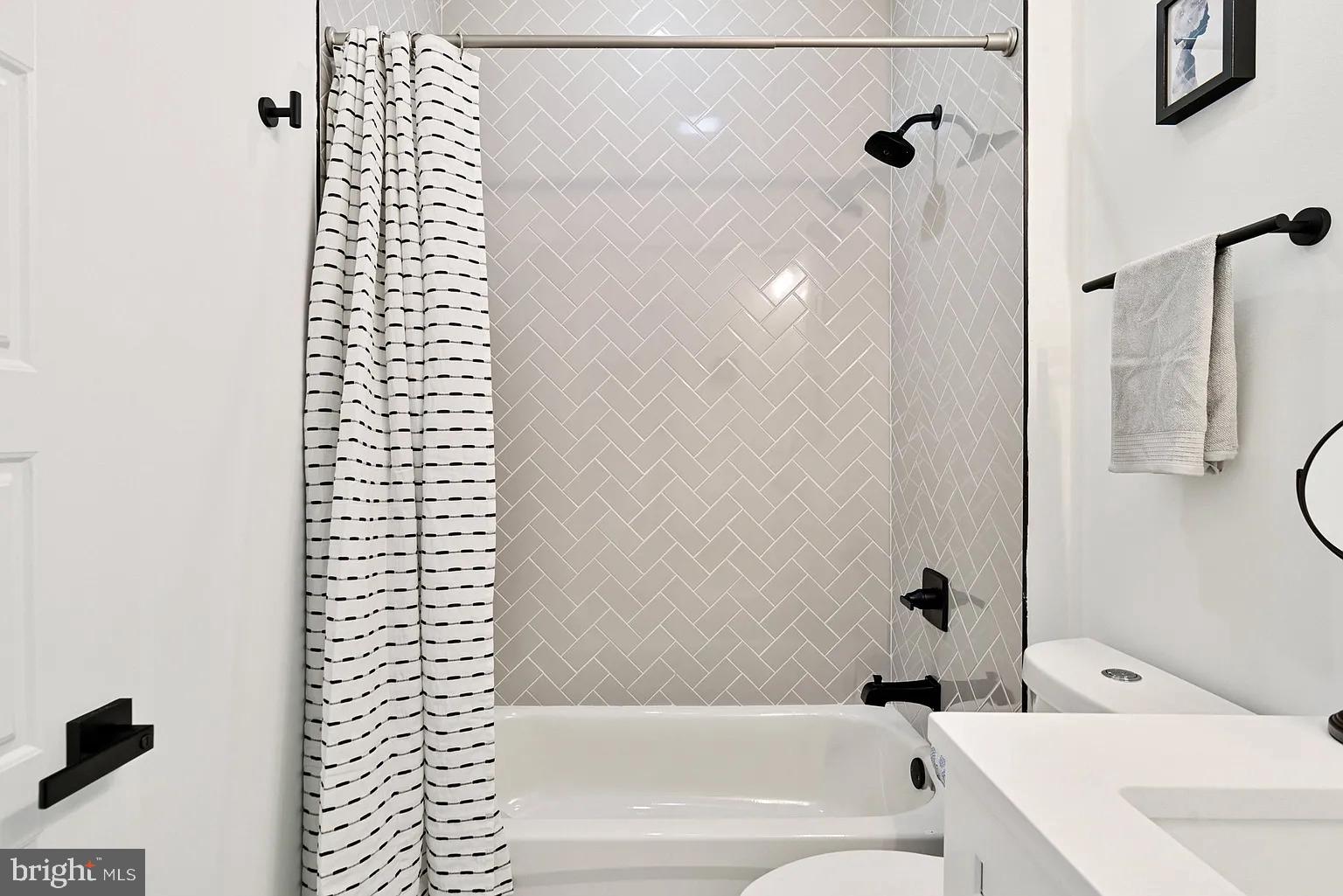 1735 South 23rd Street, Unit 2 Philadelphia, PA 19145 - Photo 10 of 17 a bathroom with a bathtub and a shower