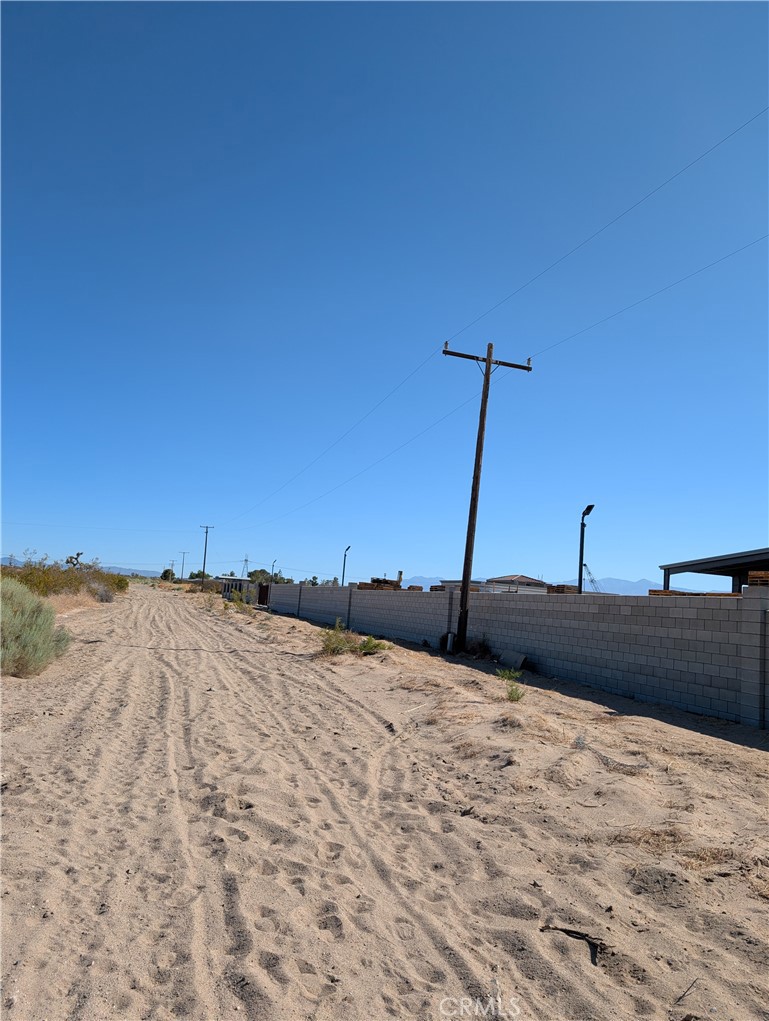 0 Verbena Parcel Road, Unit 312813111 Adelanto, CA 92301 - Photo 10 of 20 a bedroom with a bed and a closet