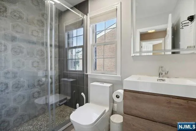 a view of a balcony with wooden fence