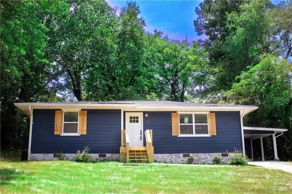 front view of a house with a yard