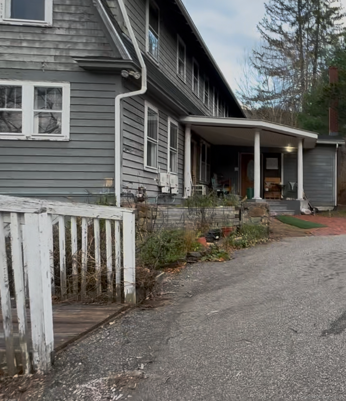 173 Leesville Road Moodus, CT 06469 - Photo 1 of 17 a front view of a house with patio