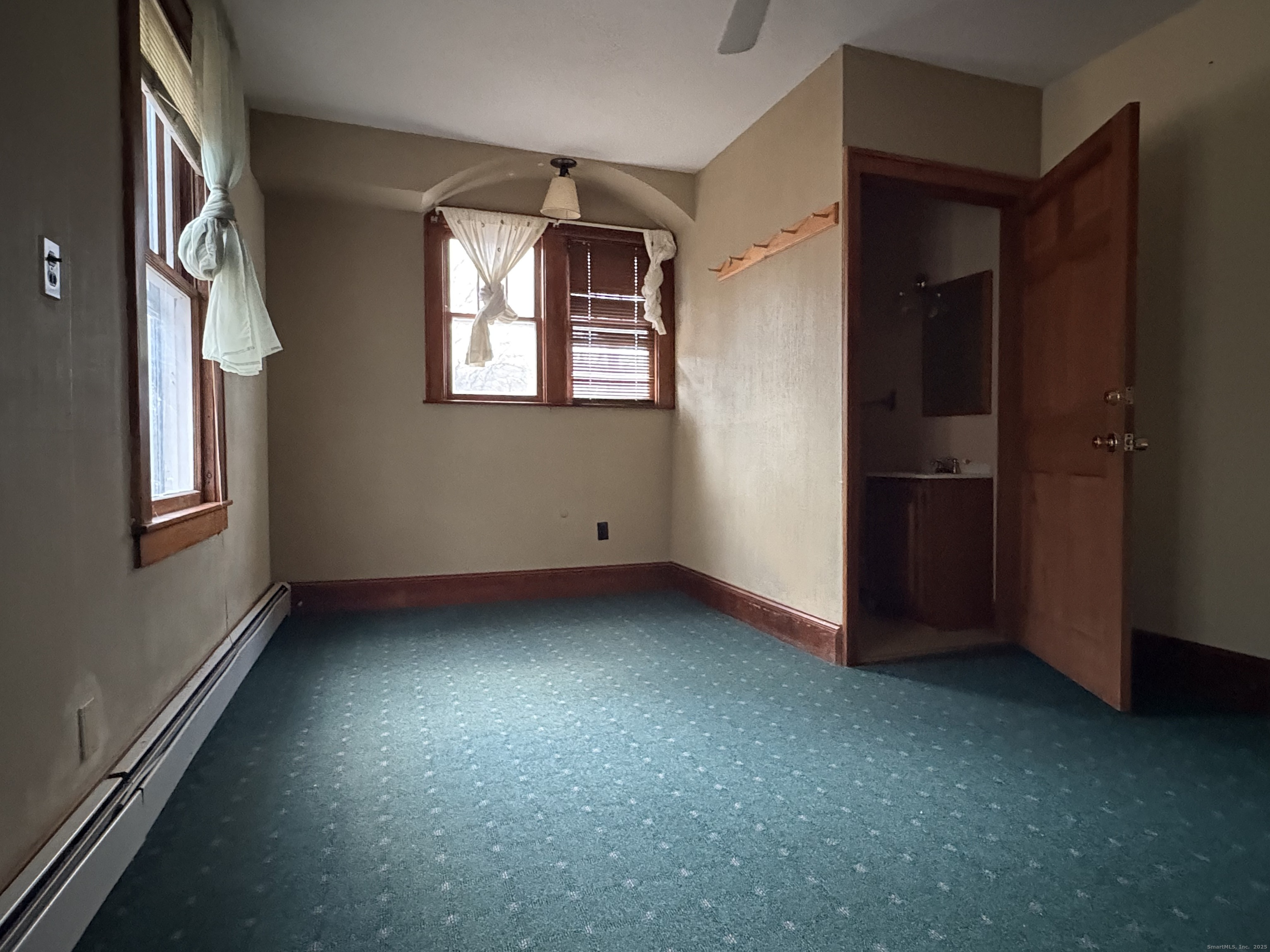 173 Leesville Road Moodus, CT 06469 - Photo 3 of 17 an empty room with windows