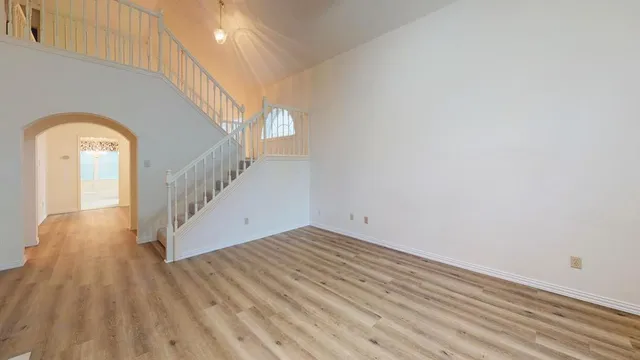 a view of entryway with wooden floor