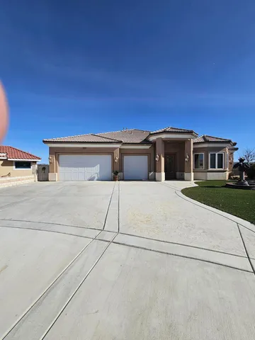 a view of a house with a street