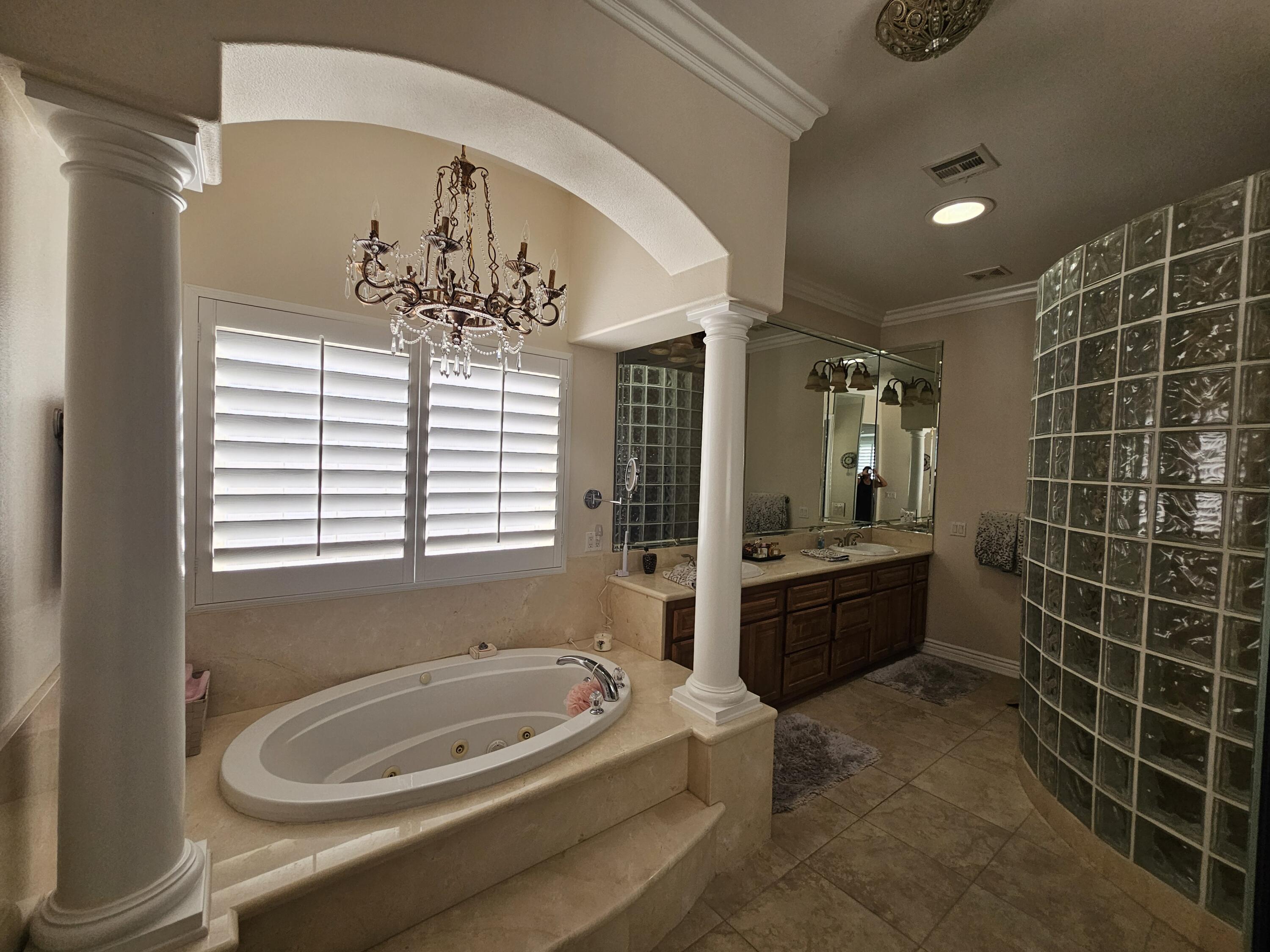 26461 Edgewater Lane Helendale, CA 92342 - Photo 17 of 24 a bathroom with a tub sink and mirror