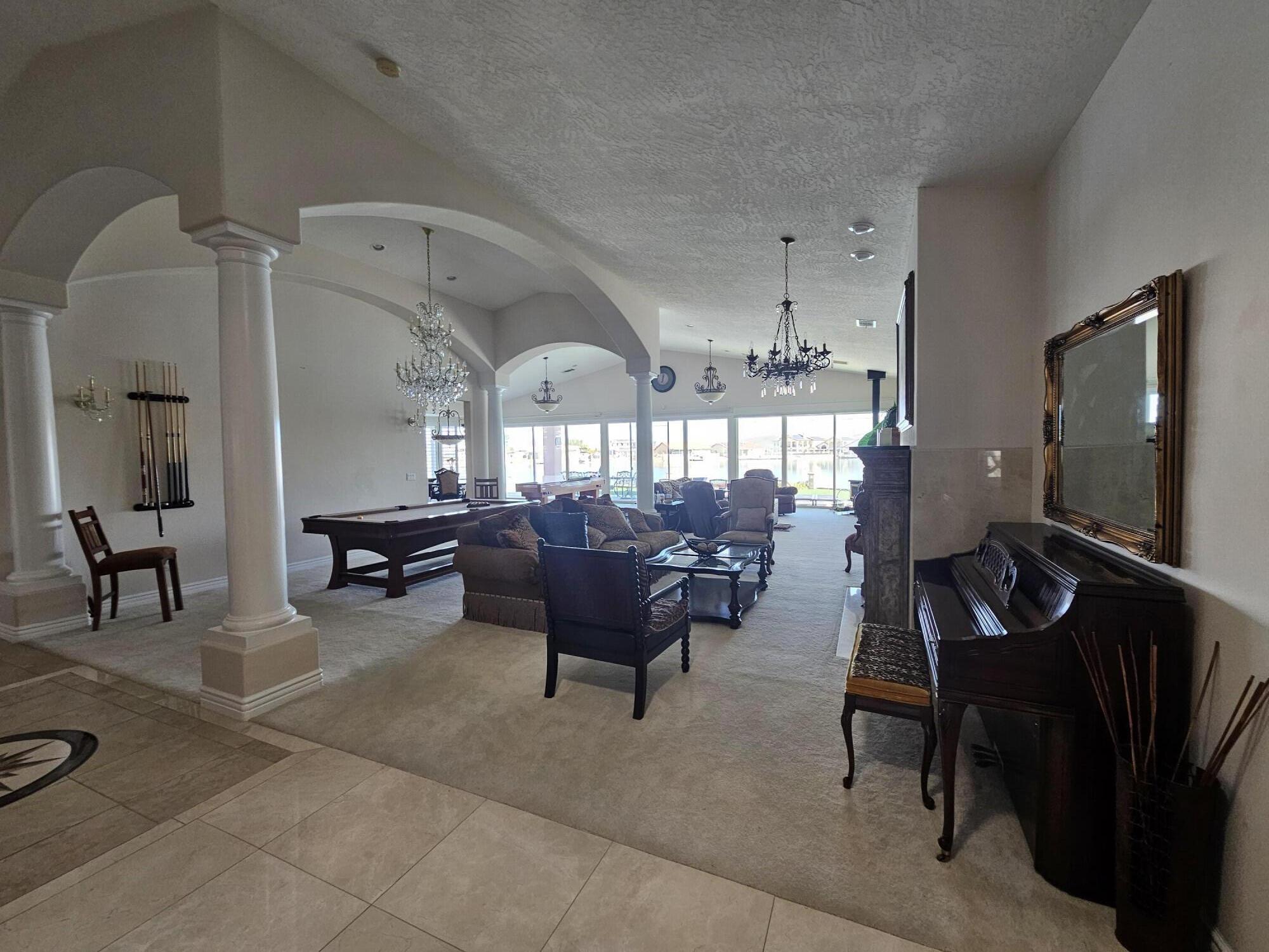 26461 Edgewater Lane Helendale, CA 92342 - Photo 2 of 24 a living room with furniture and a flat screen tv