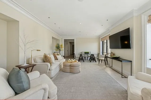 a bedroom with a bed and lamp