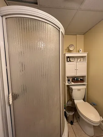 a bathroom with a toilet and a sink