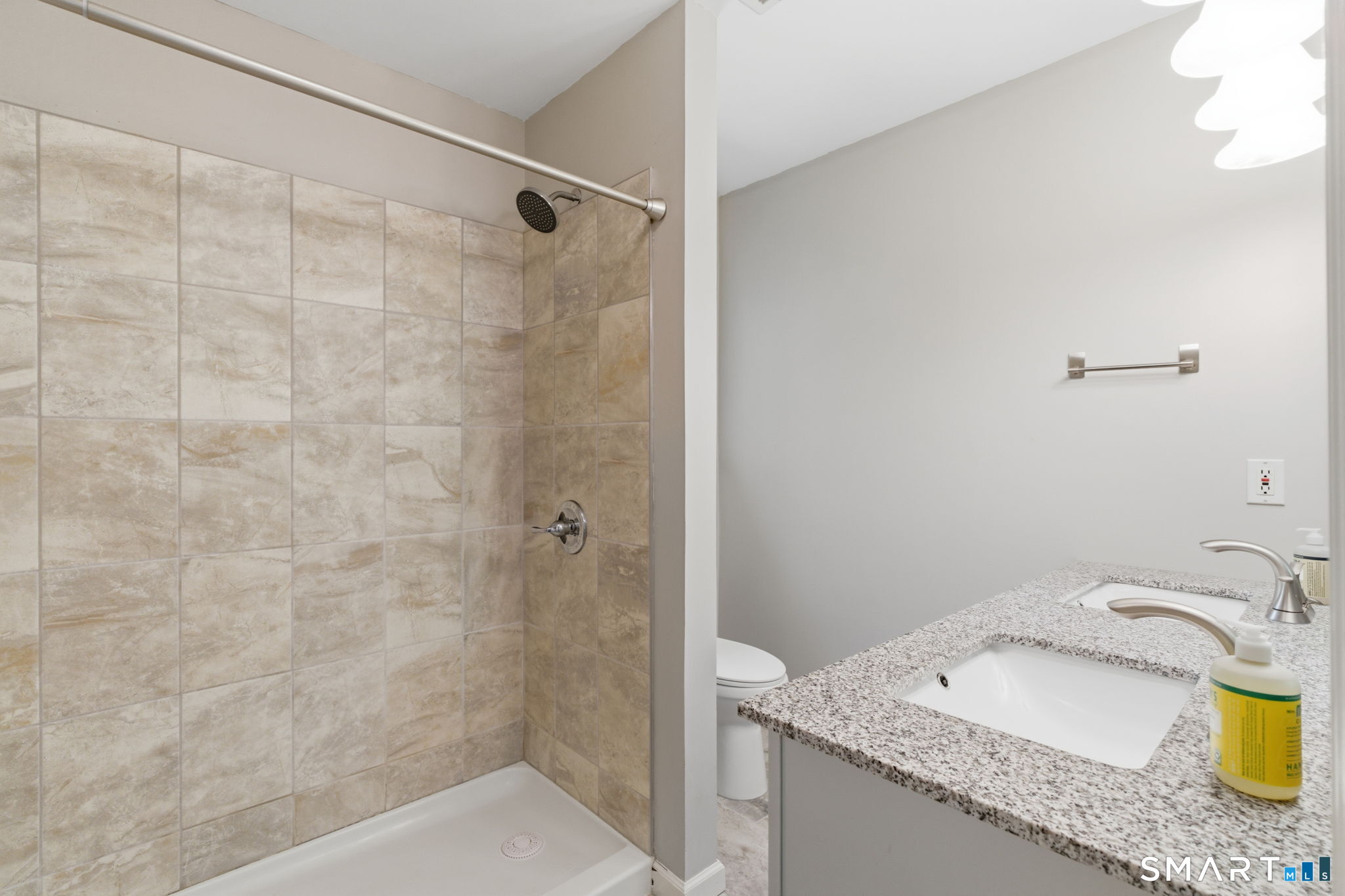 21 Greenwood Road North Granby, CT 06060 - Photo 24 of 40 a bathroom with a granite countertop sink a toilet and shower