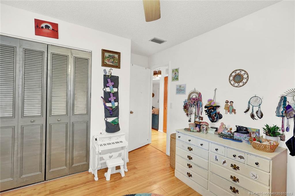 1790 Southeast Madison Street Stuart, FL 34997 - Photo 18 of 24 a room with furniture and wooden floor