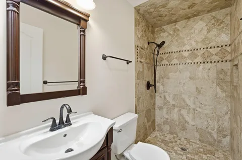 a bathroom with a sink and cabinets