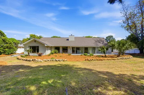 a view of a house with a big yard