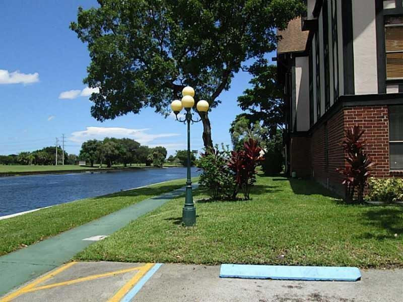 3690 Inverrary Drive, Unit 1N Lauderhill, FL 33319 - Photo 29 of 29 Serene walking trails by the water.