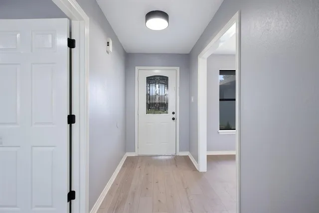 wooden floor and window in a room
