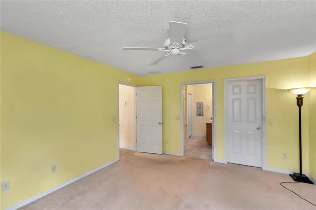 an empty room with a bathroom