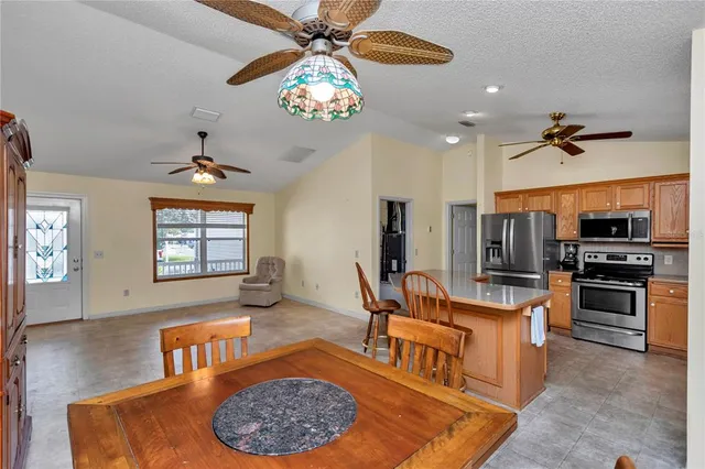 a living room with fireplace furniture and a flat screen tv