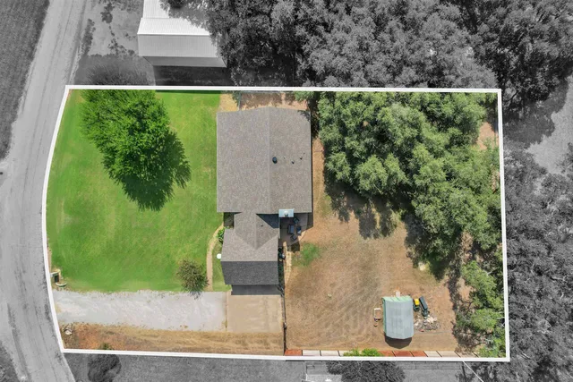 an aerial view of residential building and green space