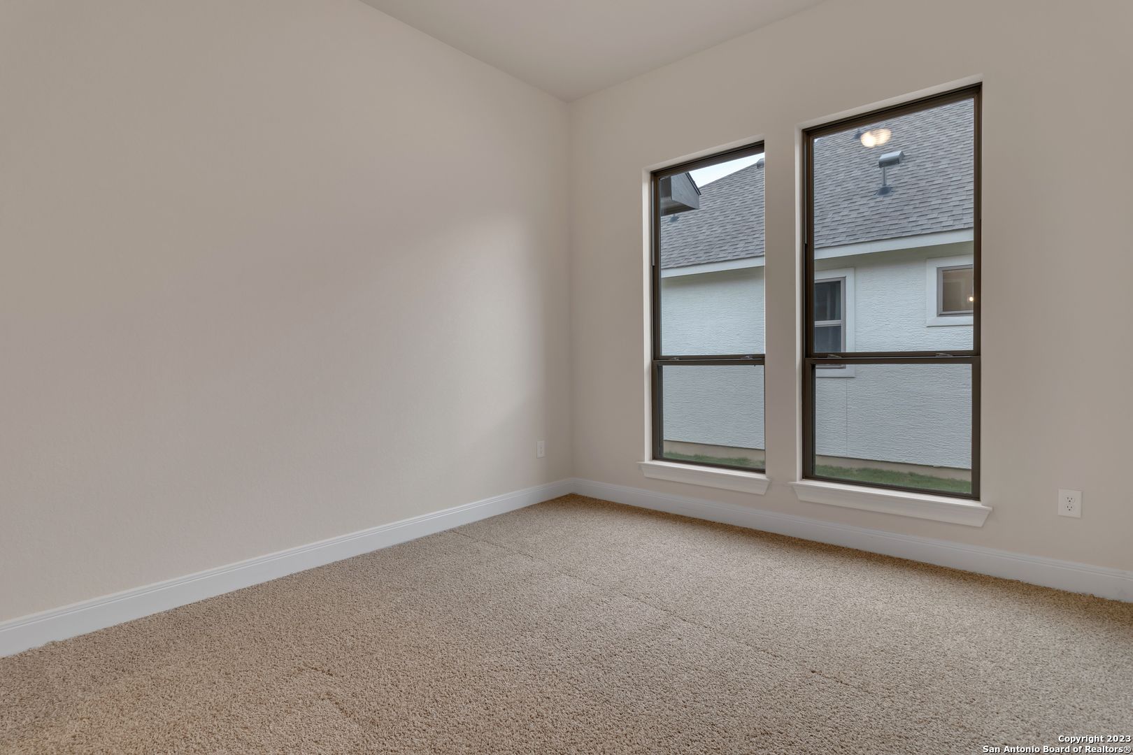 107 Matador Boerne, TX 78006 - Photo 19 of 35 an empty room with a empty space and window