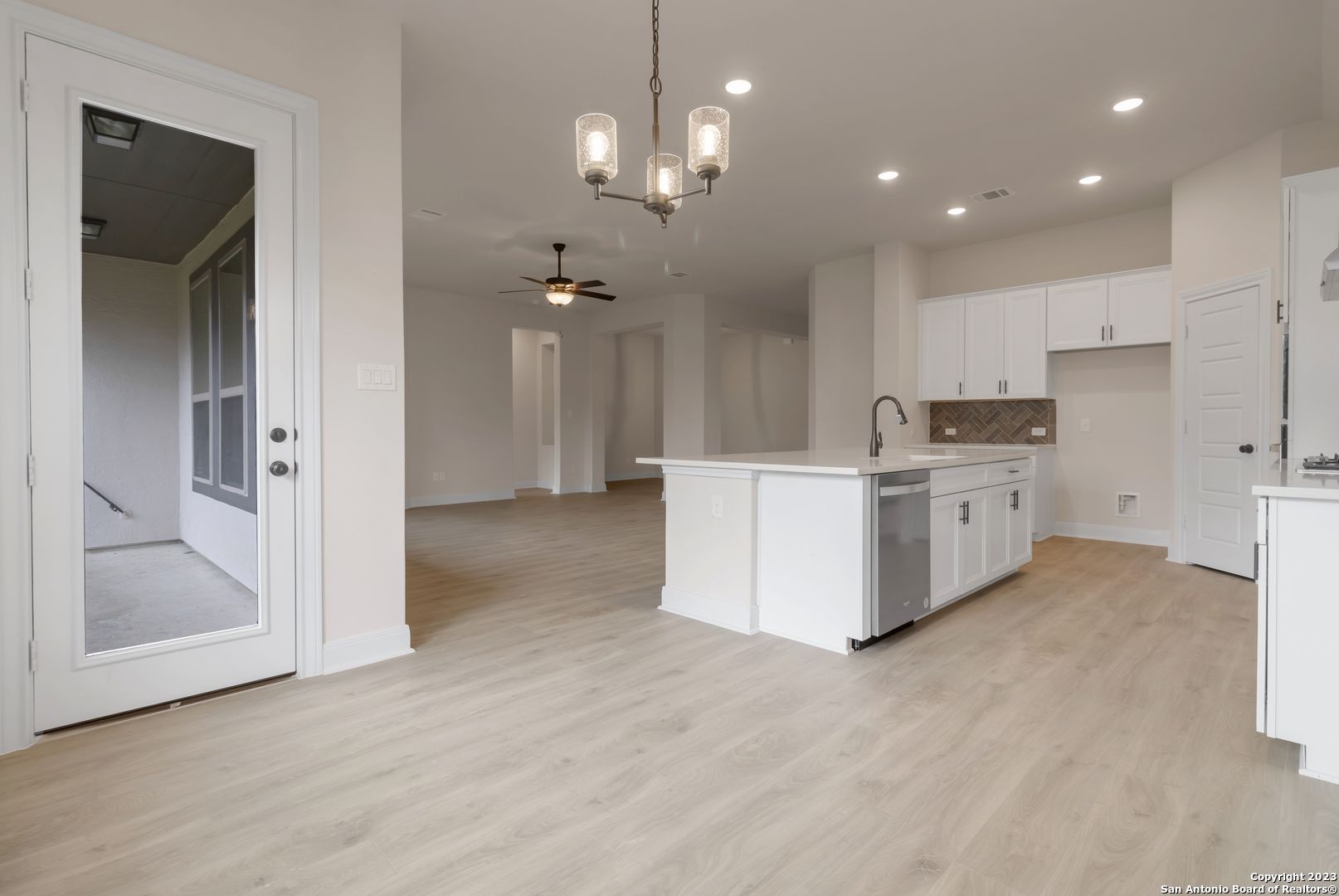 107 Matador Boerne, TX 78006 - Photo 8 of 35 a view of a kitchen with a sink cabinets and window