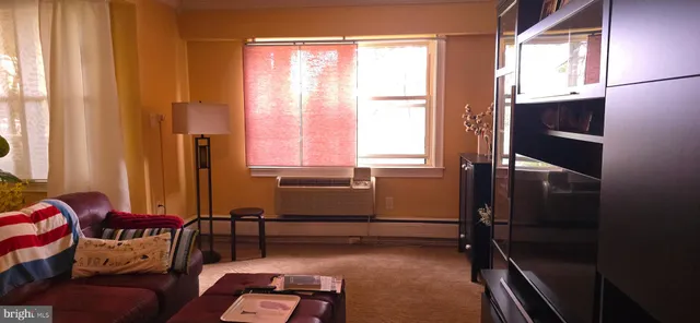 a room with furniture and a window