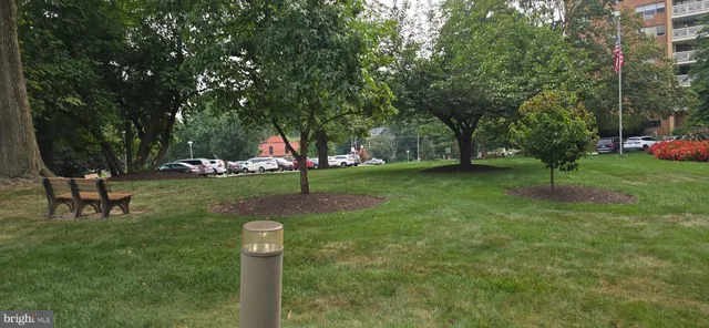 a front view of a house with a yard table and chairs