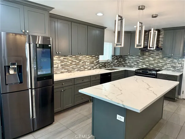 a view of a kitchen with kitchen and microwave