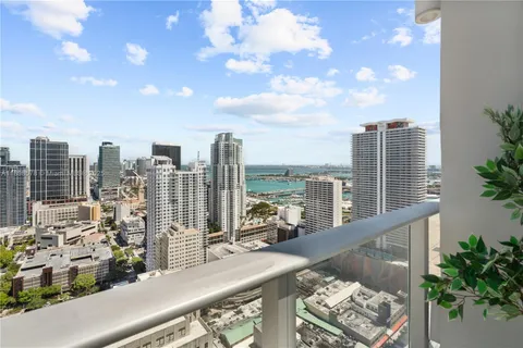 a view of a balcony with city view