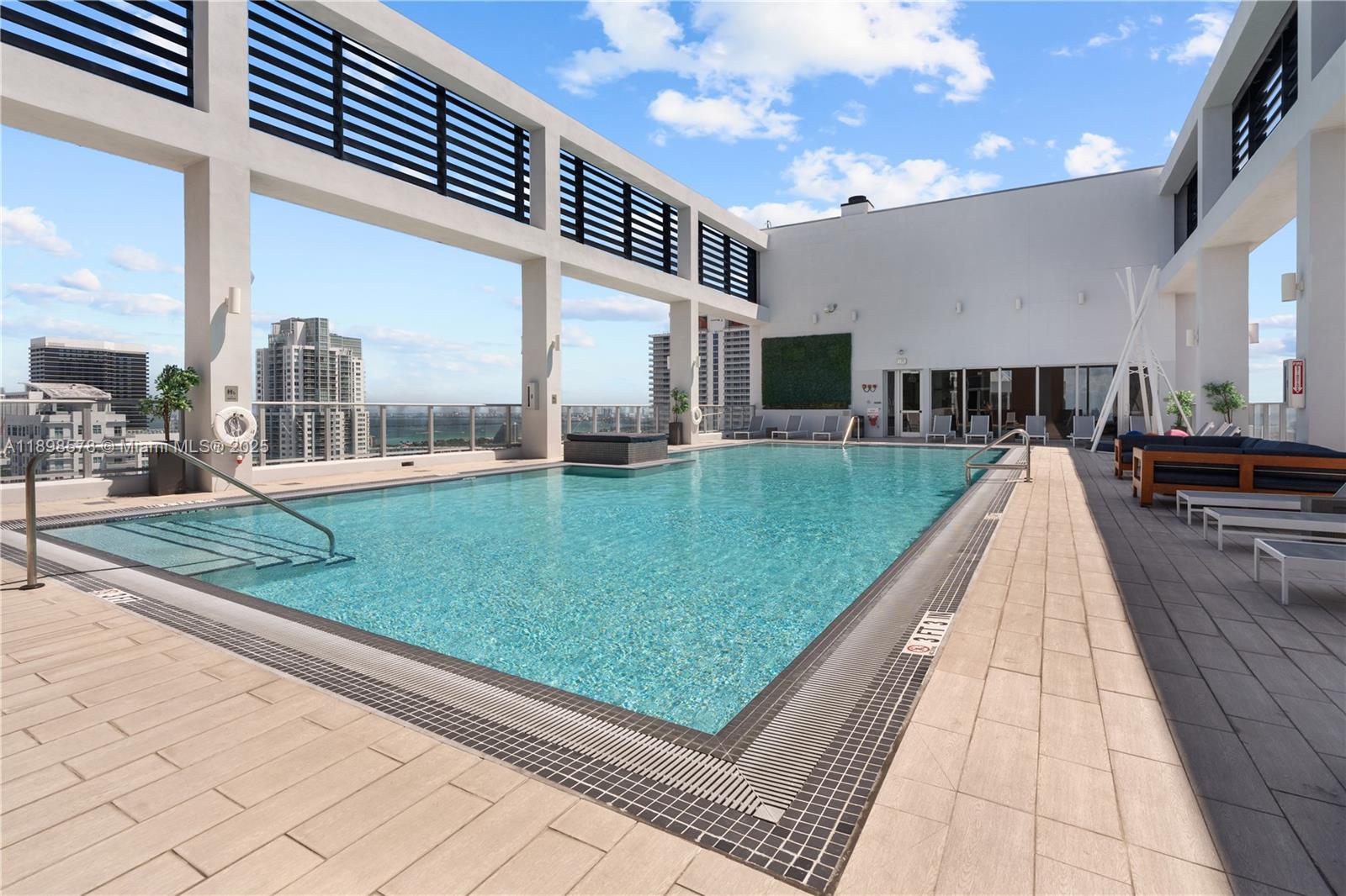 151 Southeast 1st Street, Unit 1402 Miami, FL 33131 - Photo 14 of 16 a view of a backyard with sitting area