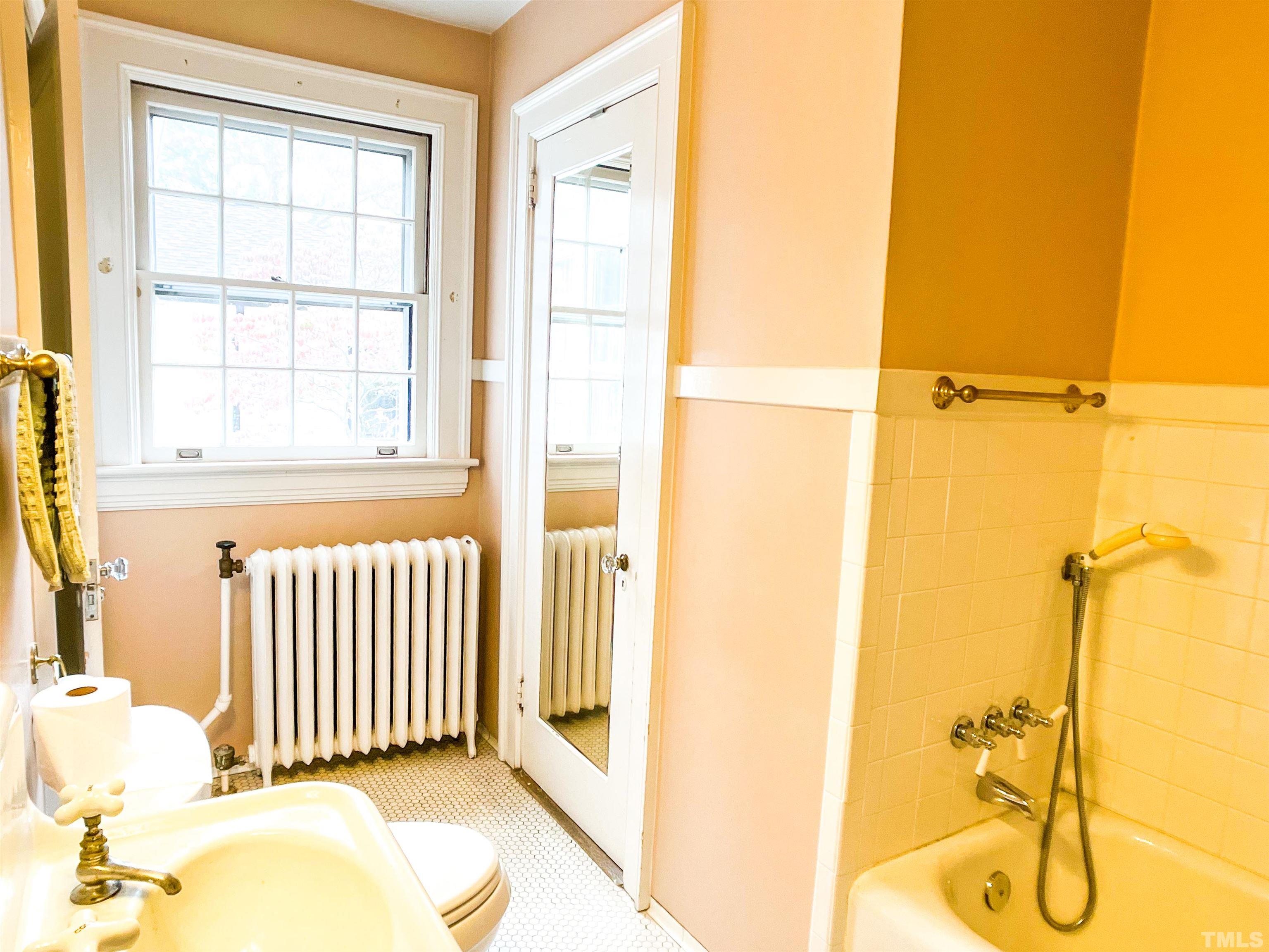 205 Woodburn Road Raleigh, NC 27605 - Photo 21 of 42 a view of a bathroom with a shower