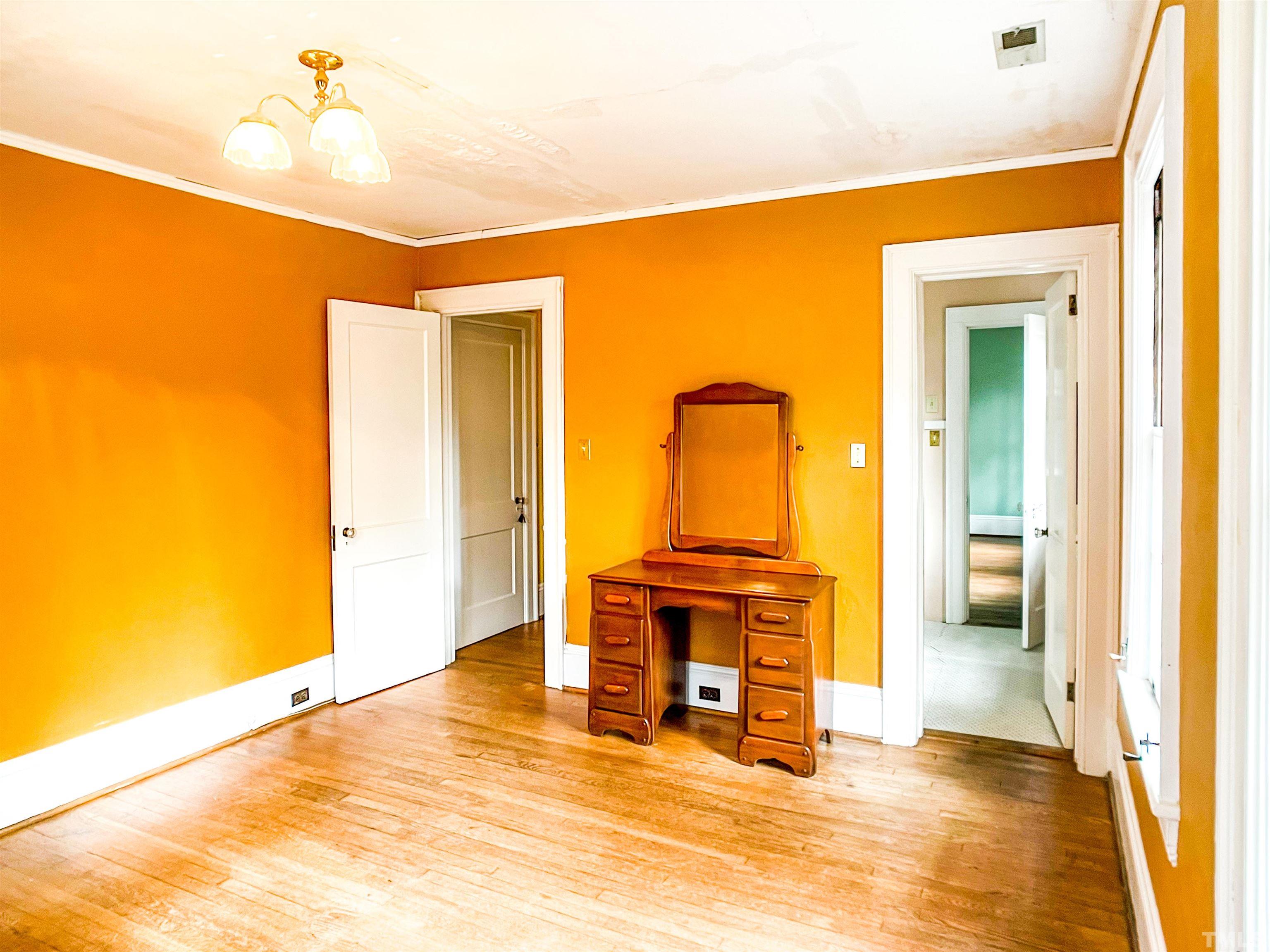 205 Woodburn Road Raleigh, NC 27605 - Photo 25 of 42 a view of kitchen with furniture and refrigerator