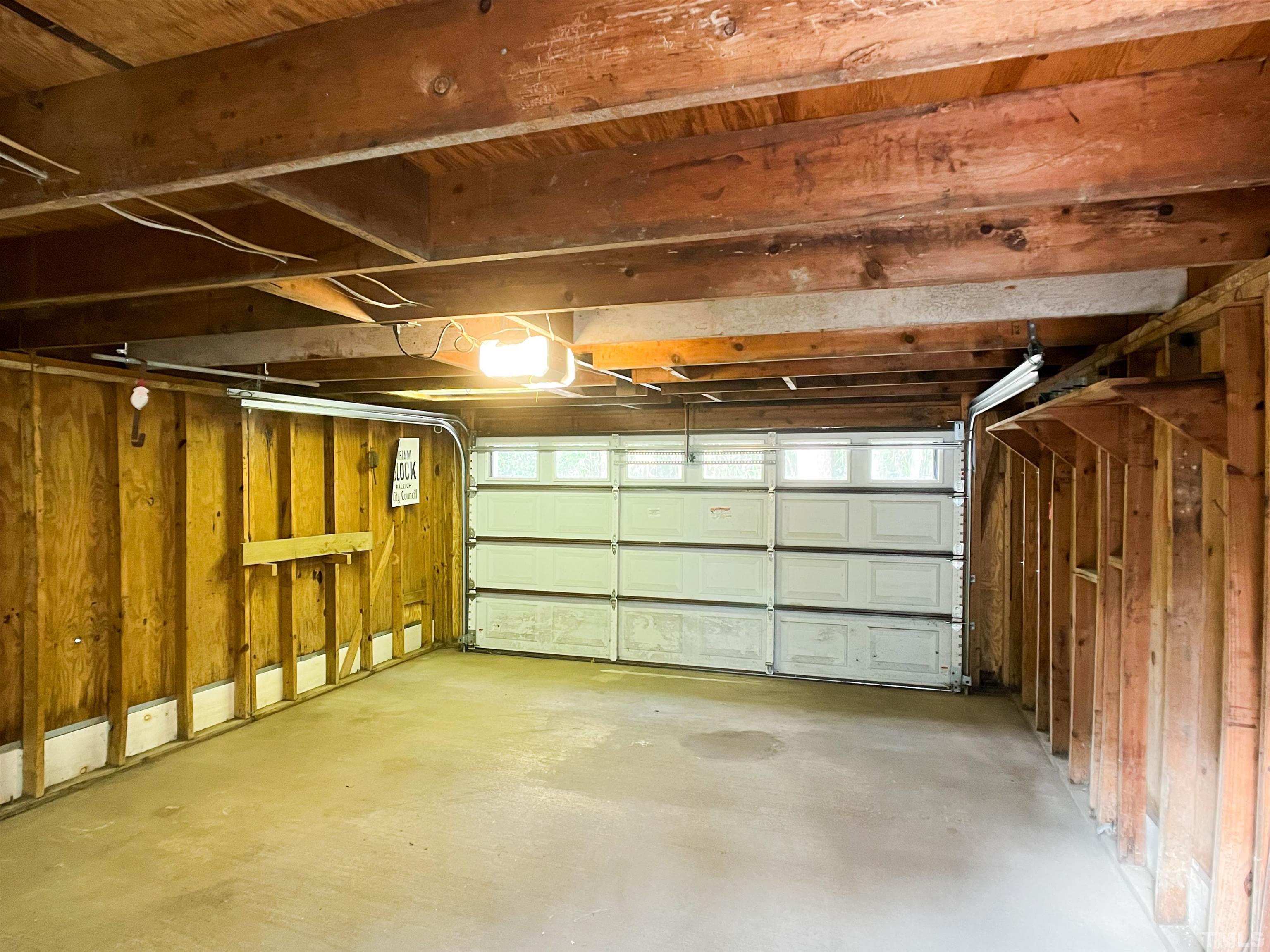 205 Woodburn Road Raleigh, NC 27605 - Photo 40 of 42 a view of a room with wooden walls