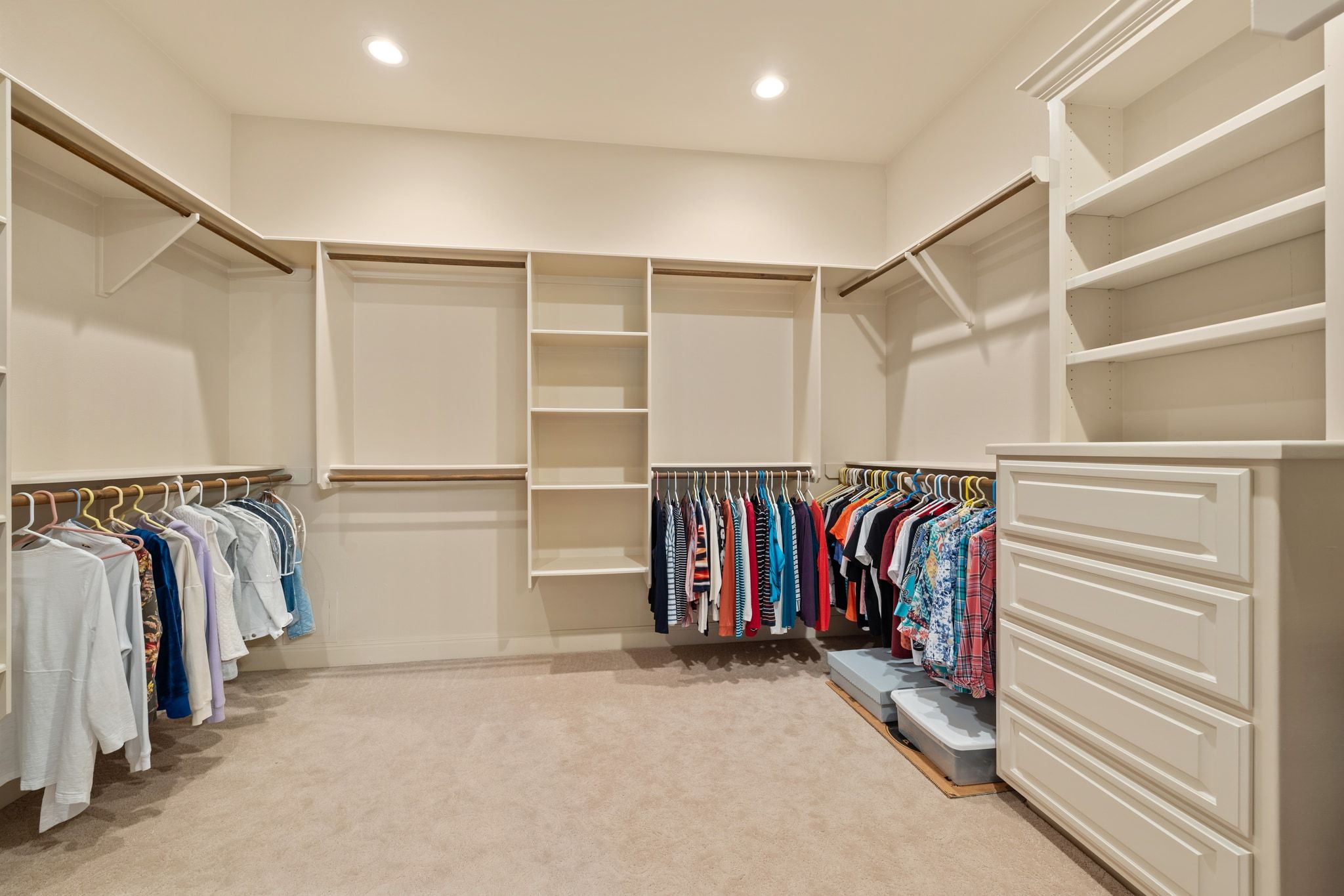 14 Borello Drive, Unit 14 Austin, TX 78738 - Photo 20 of 33 a view of walk in closet with clothes